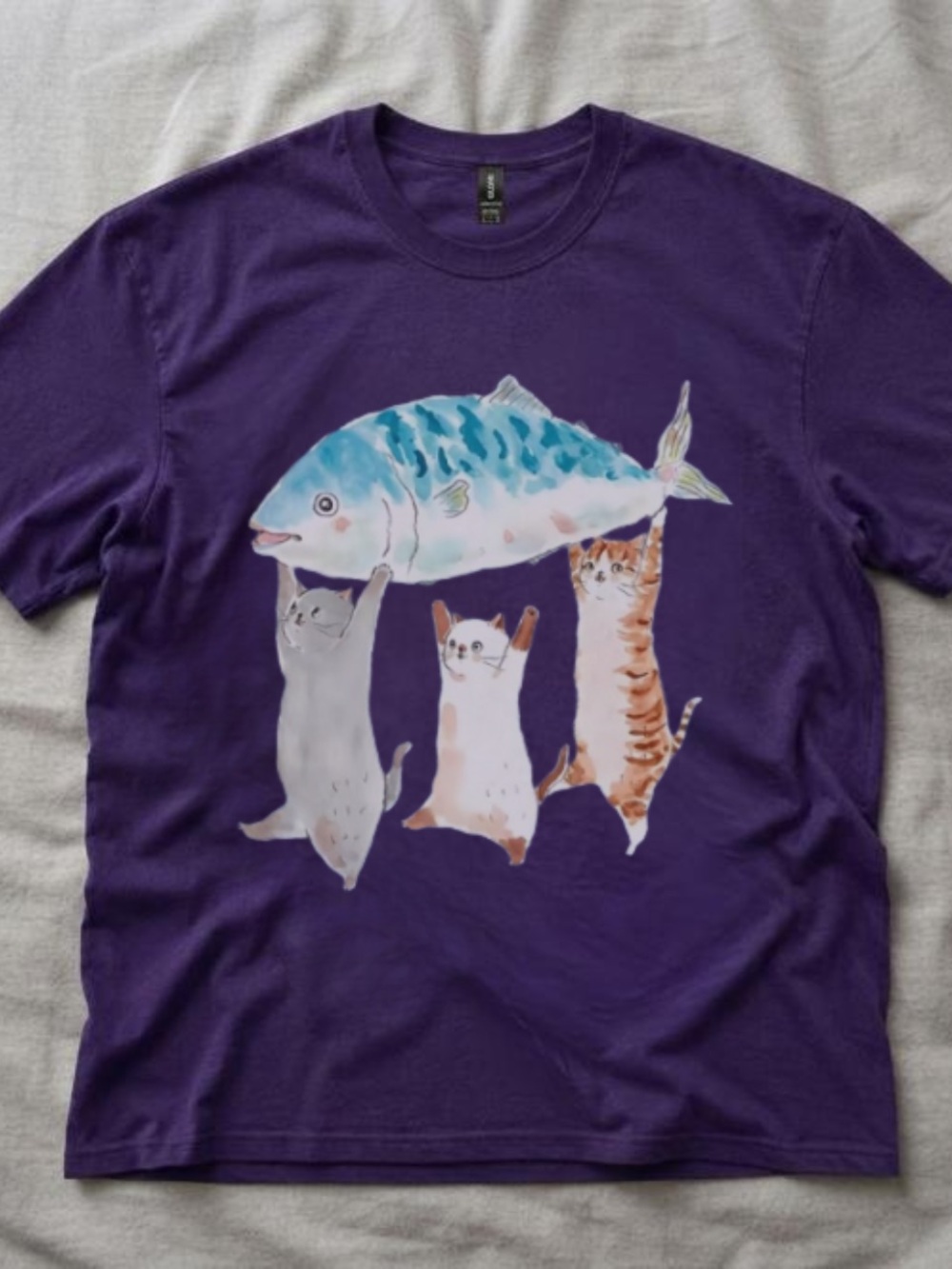 Gildan Purple Tee with Three Cats Lifting a Blue Fish Graphic
